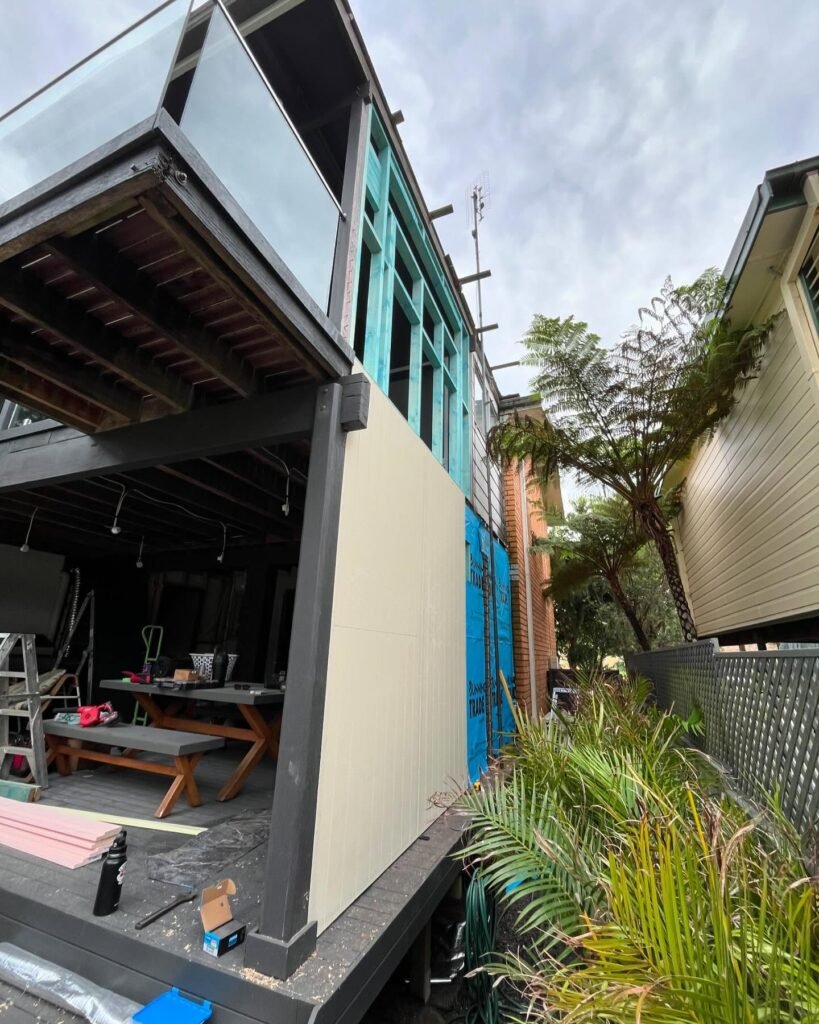 Deck infill wall with weatherboard cladding
